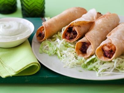 Chicken flautas with avocado sauce - Mexican recipe